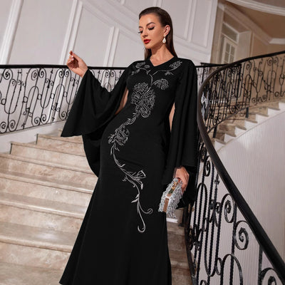 Abito lungo elegante con maniche a pipistrello