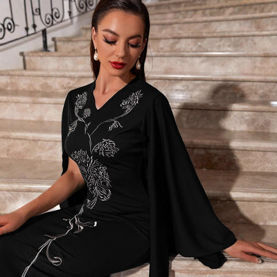Abito lungo elegante con maniche a pipistrello
