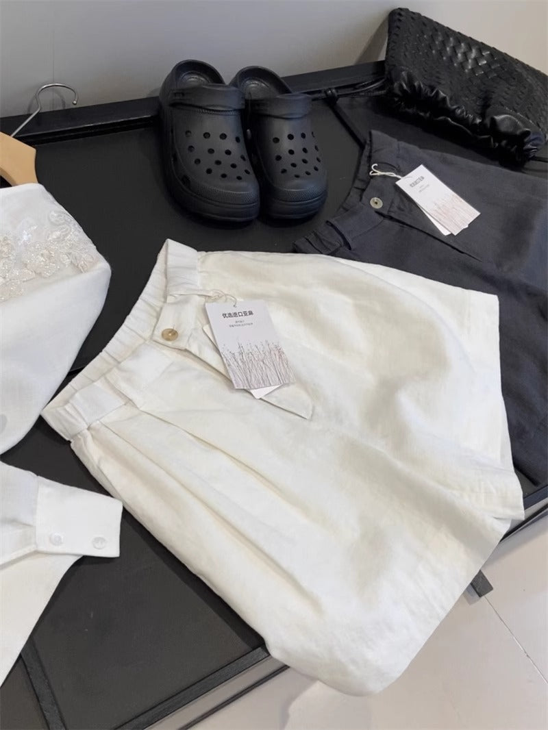 Pantaloncini in lino con cintura intrecciata